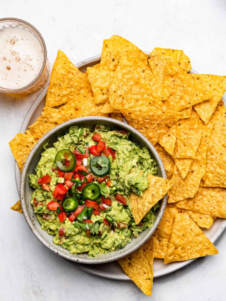 The best guacamole served in a bowl with tortilla chips