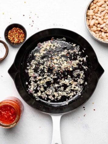 sautéing shallots and garlic in skillet