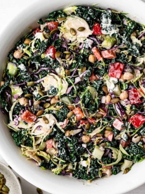 Close up of Chopped Kale Salad with tahini dressing in bowl
