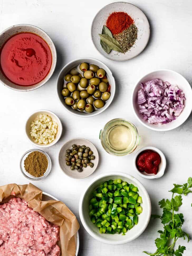 Ingredients for recipe prepared and sorted in small bowls. 