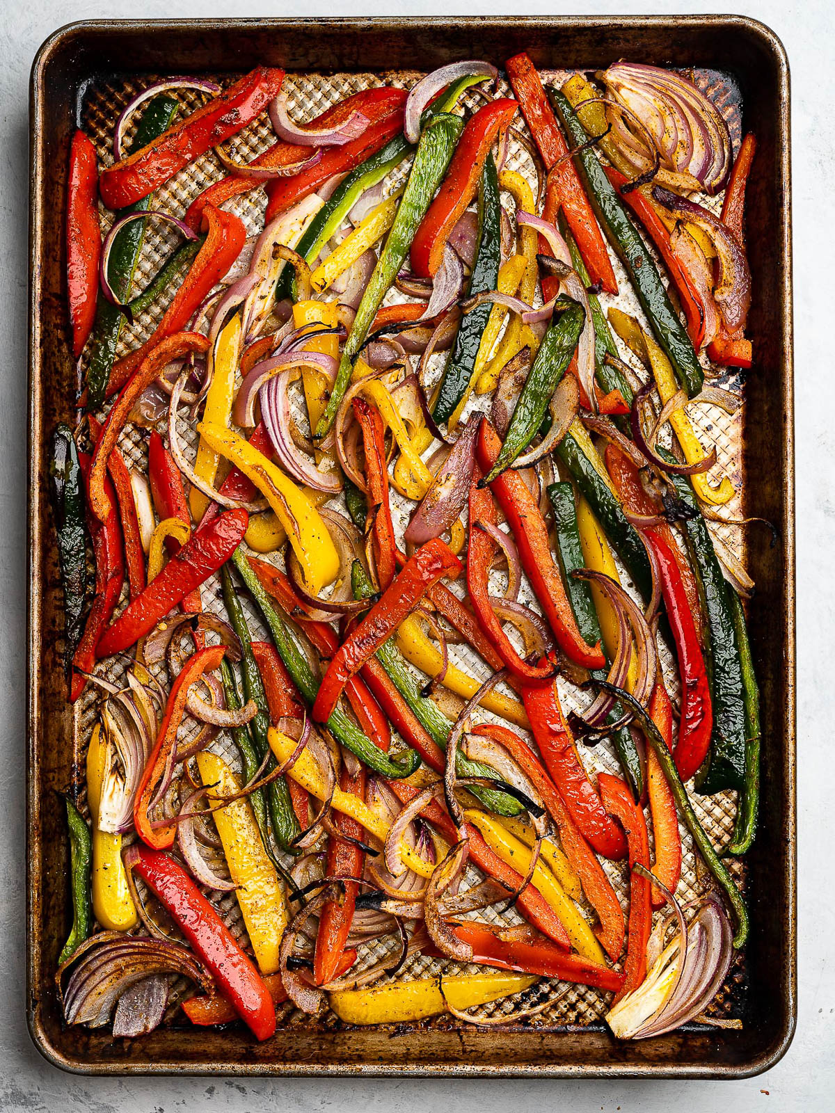 cooked veggies on sheet pan