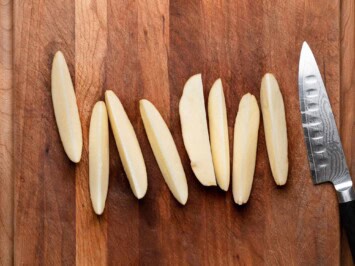 cutting potatoes into 8 wedges