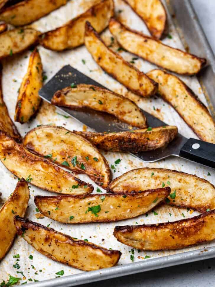 baked potato wedges on sheet pan