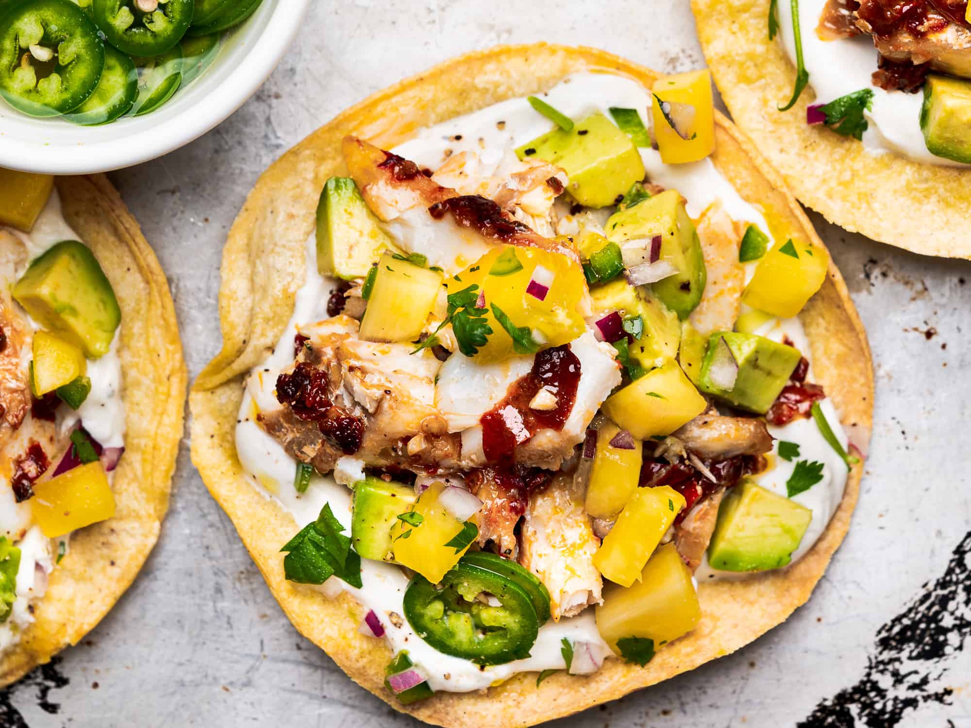 close up of fish tostadas with pineapple salsa