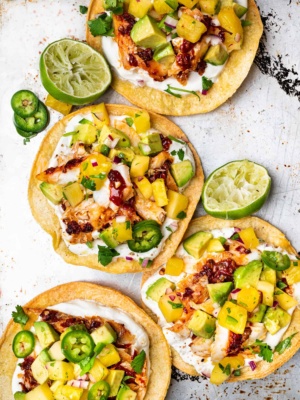 Tostadas topped with fish and pineapple salsa