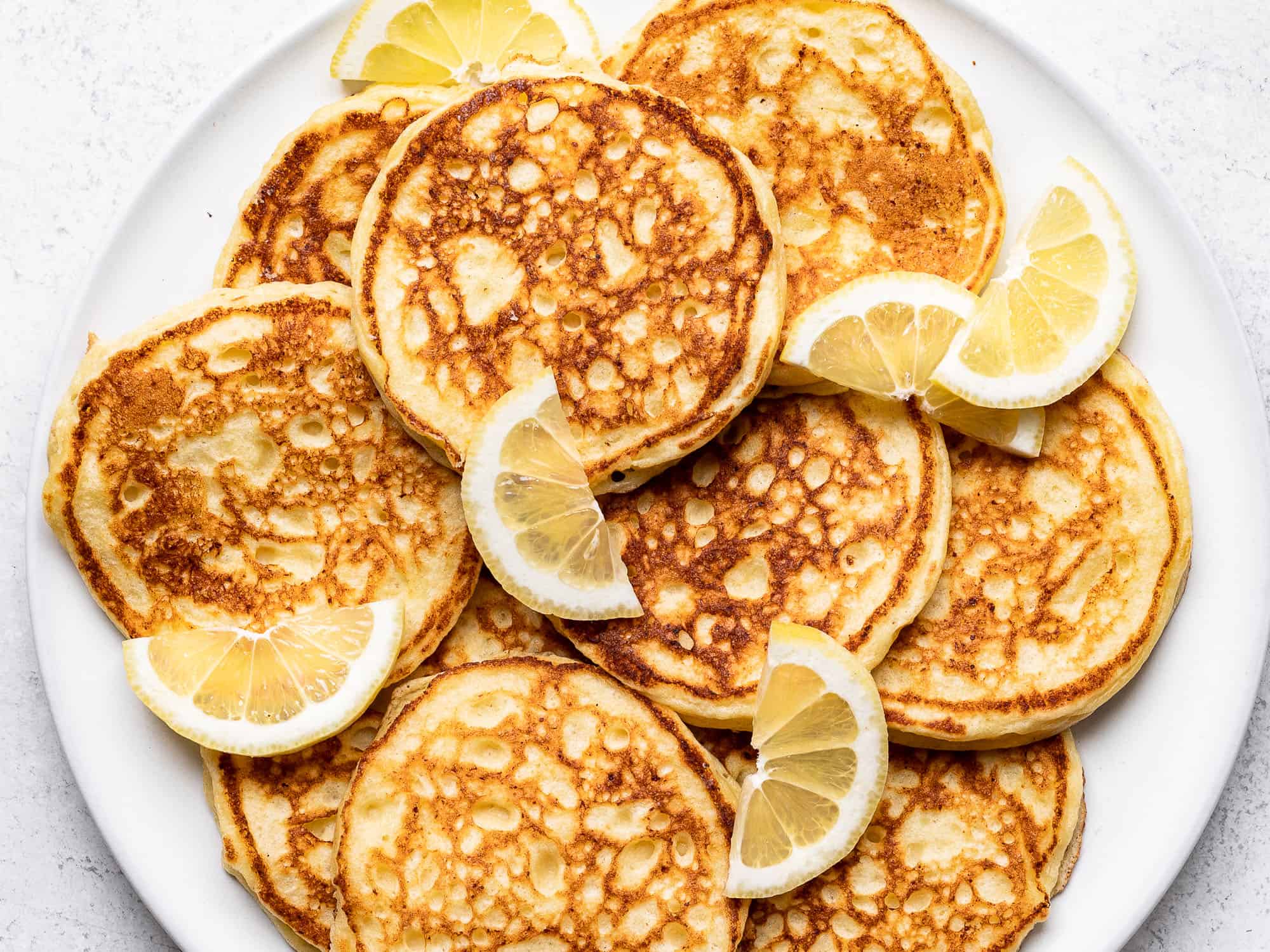 lemon ricotta pancakes on a plate 