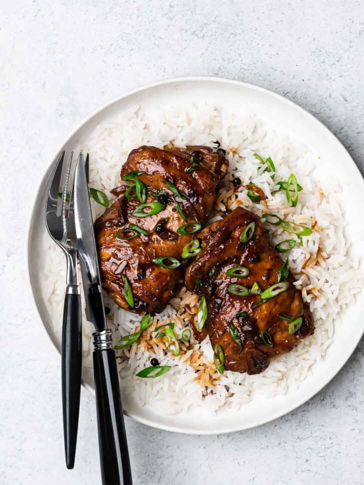 chicken adobo on plate with rice