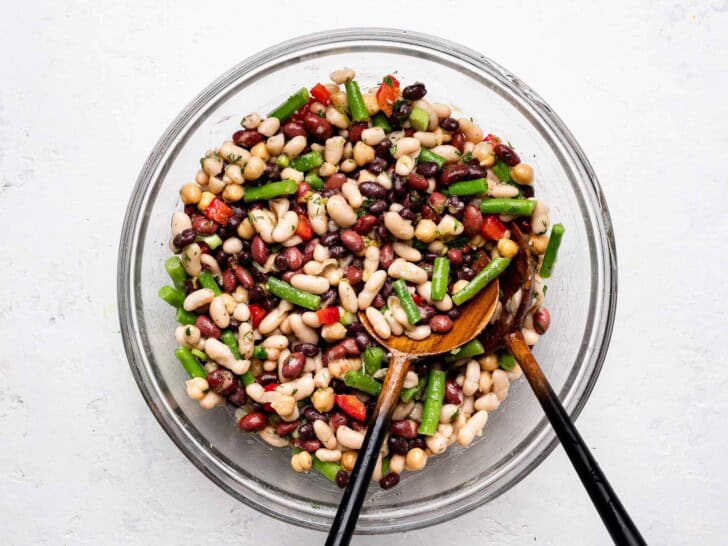 mixing salad in mixing bowl