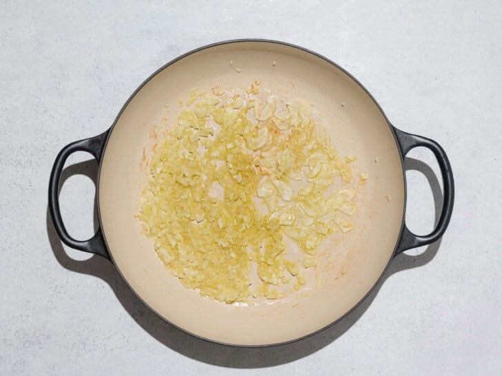 sautéing onions and garlic in skillet