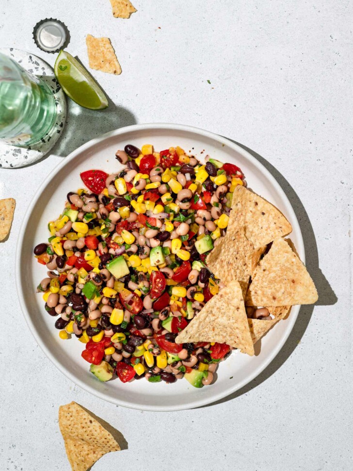 cowboy caviar on plate with tortilla chips