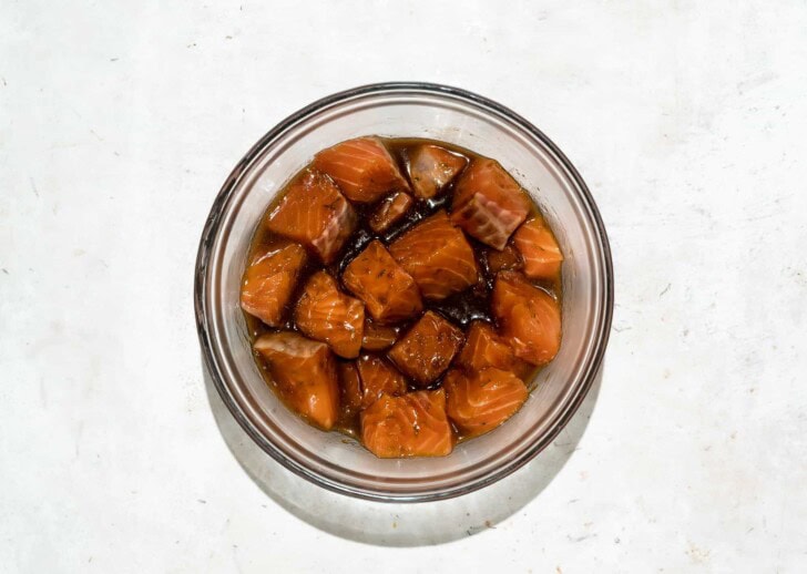 marinating salmon pieces in bowl