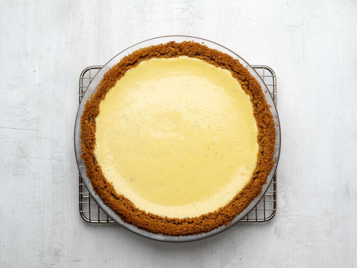 baked key lime pie cooling on wore rack