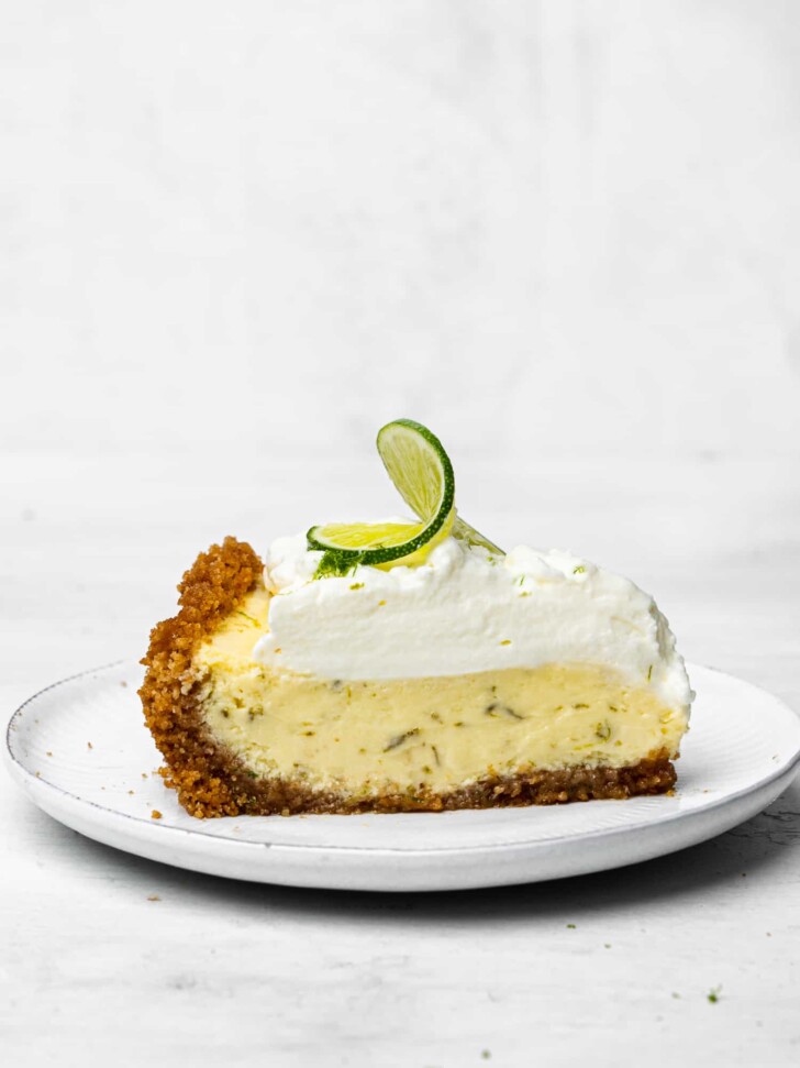 side-view of slice of key lime pie on plate