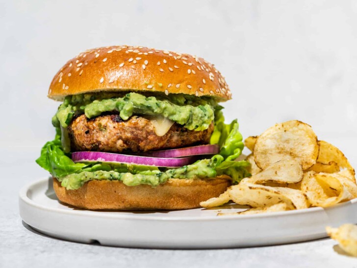 Poblano Turkey burger on plate with chips