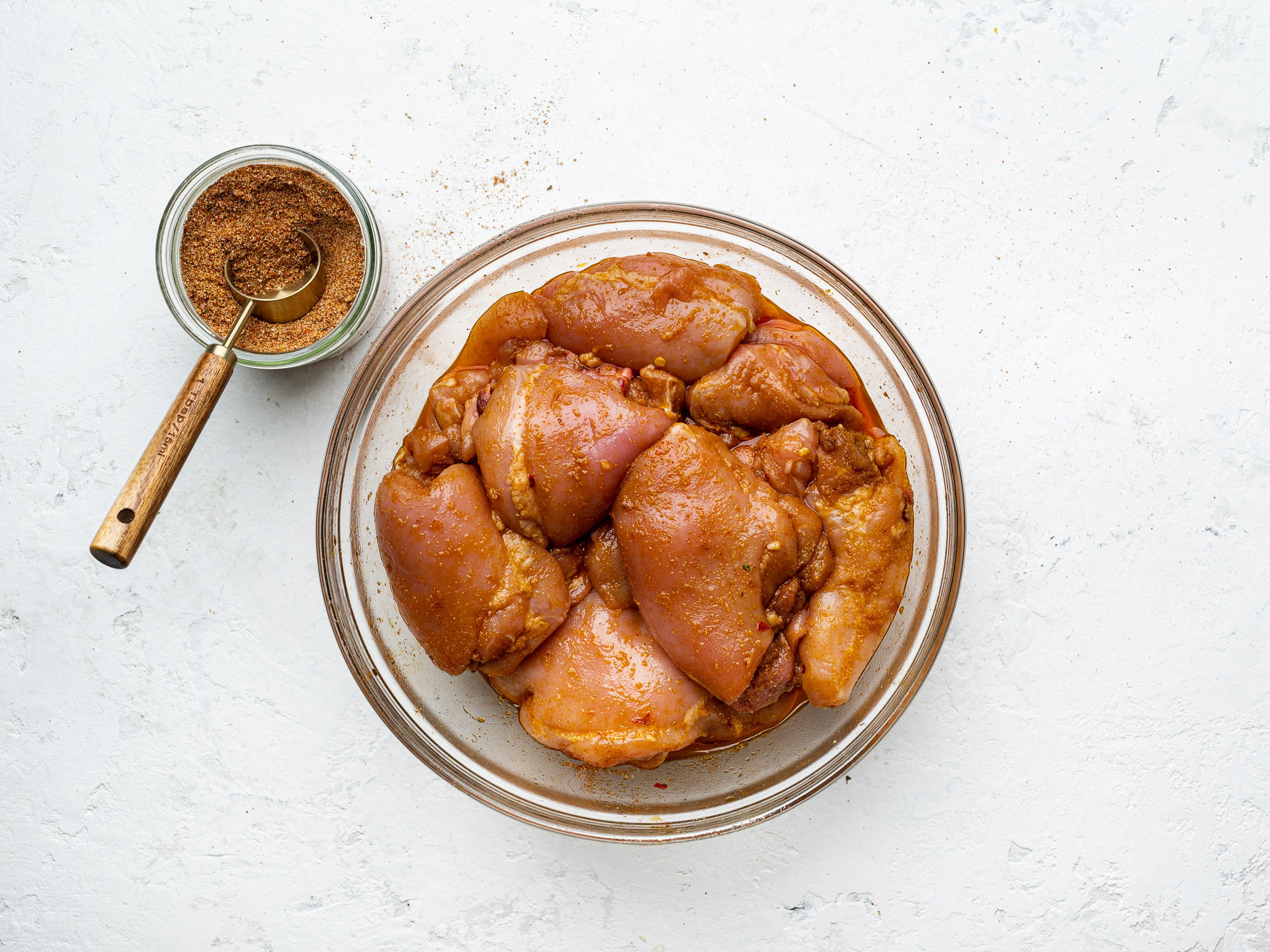 chicken marinating with fajita seasoning