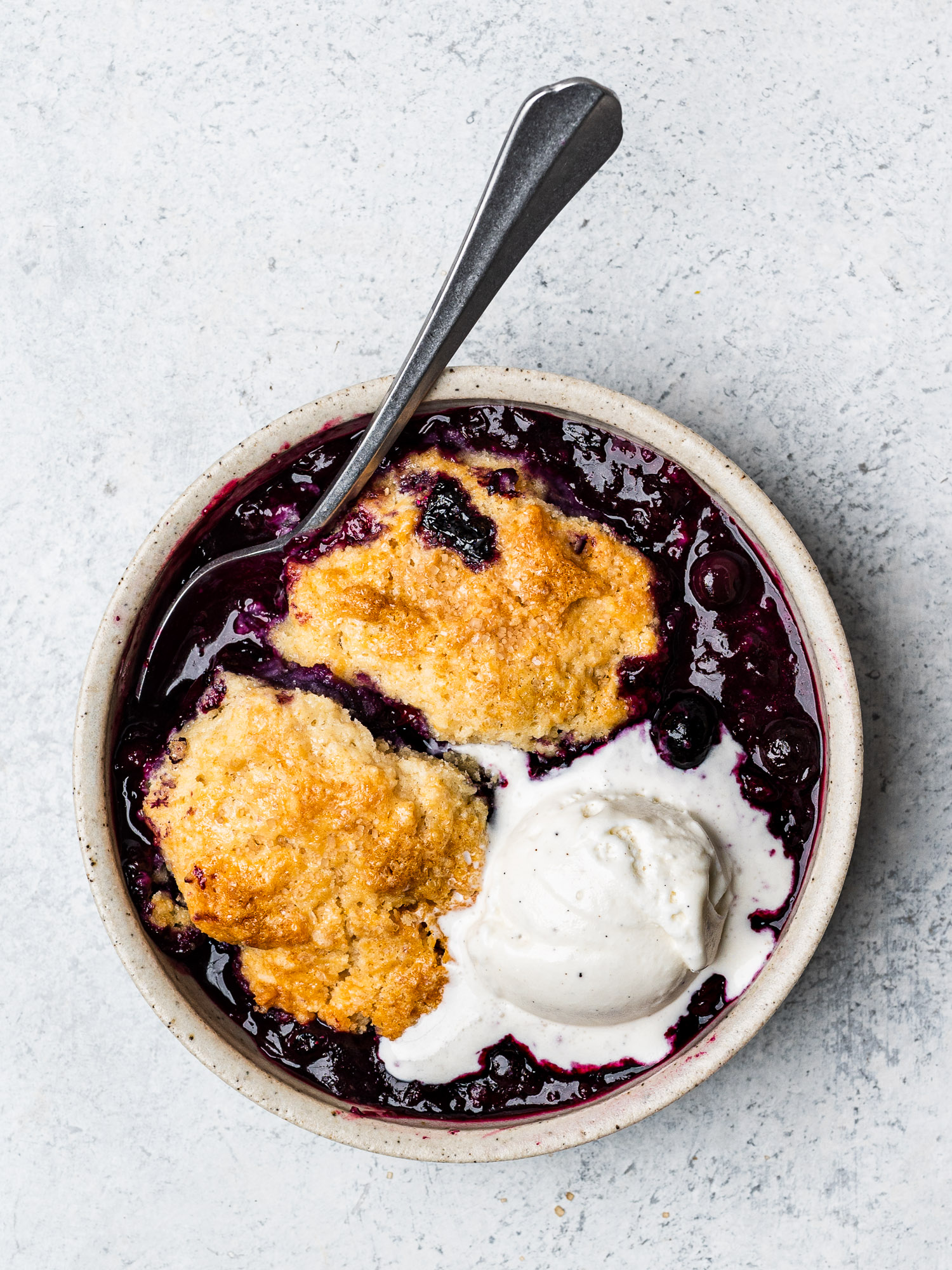 blueberry cobbler served in small bowl