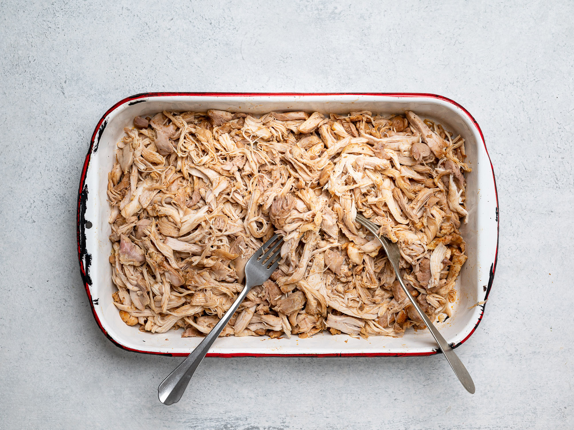 shredded chicken in tray