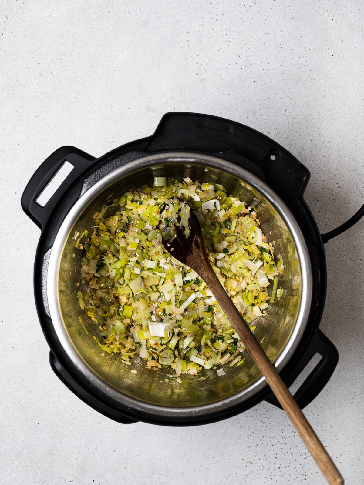 sautéing leeks in pot