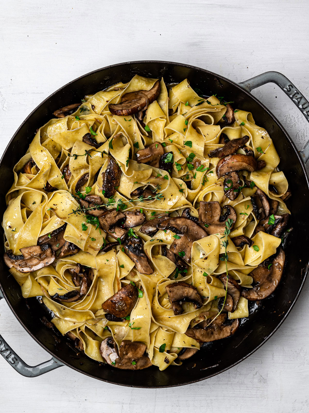 pappardelle with mushroom sauce in skillet