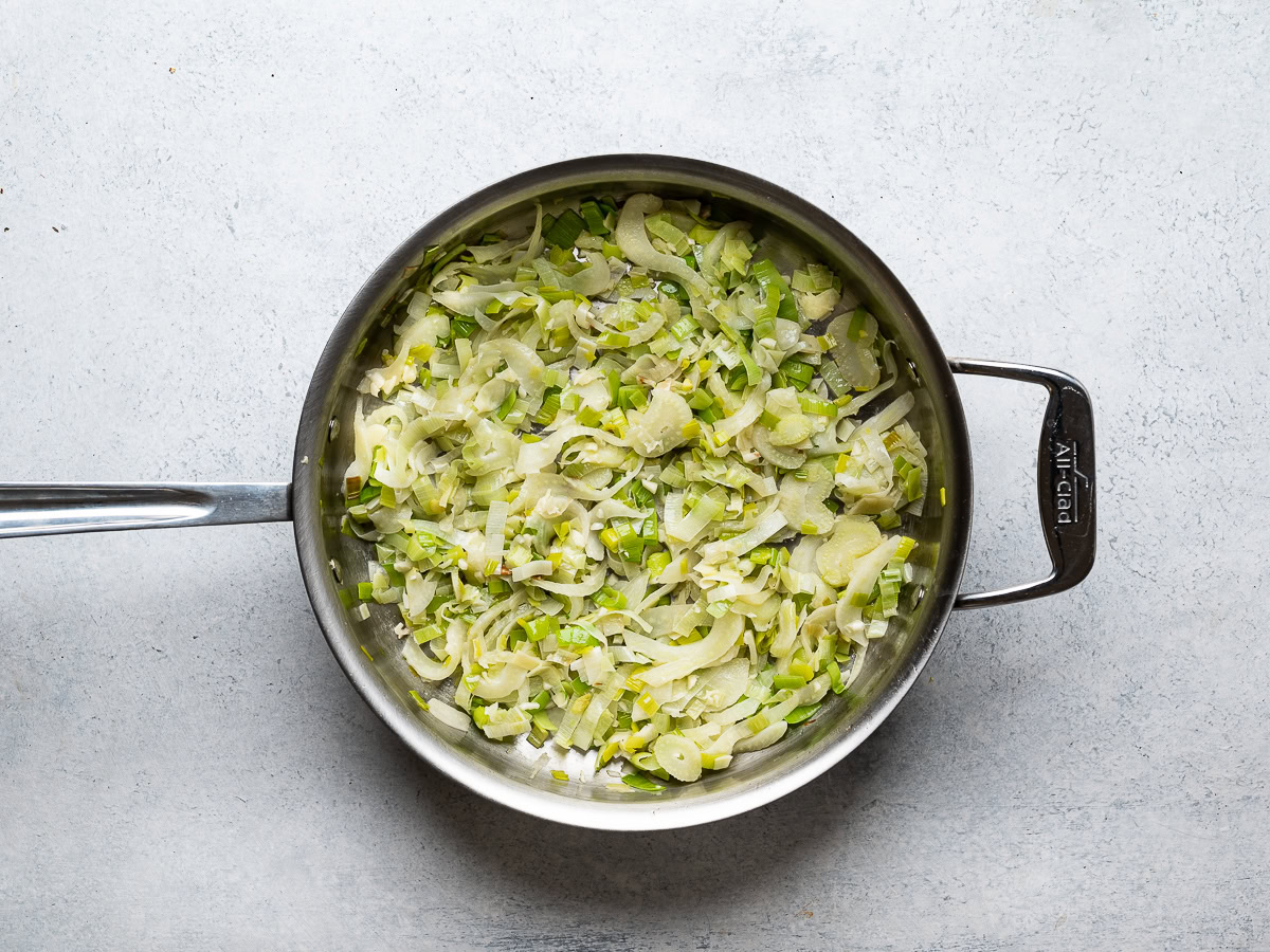 sautéed leeks and fennel in skillet