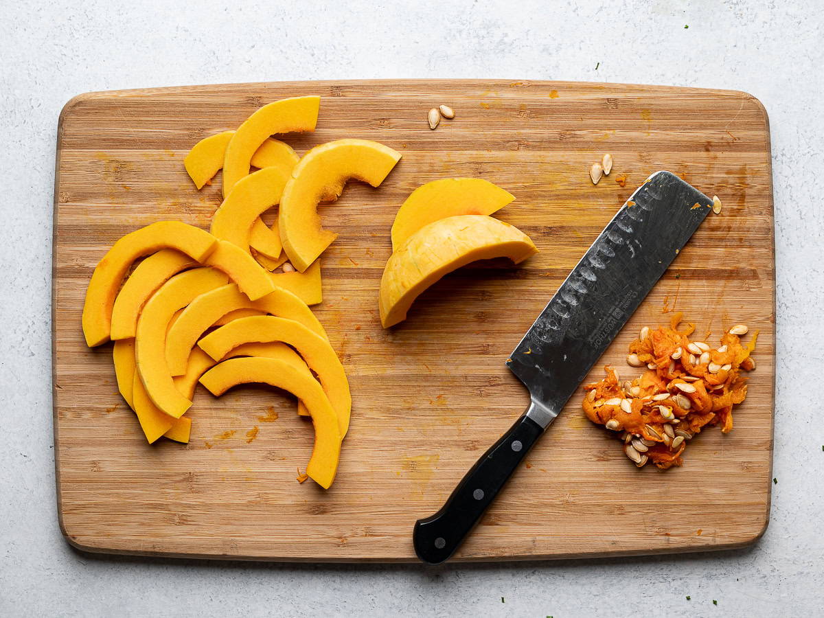 slicing halved squash bulb