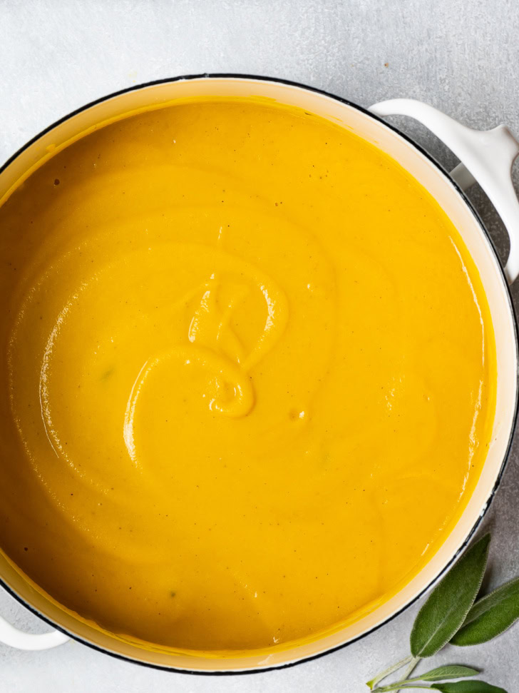 close-up of blended butternut squash soup in pot