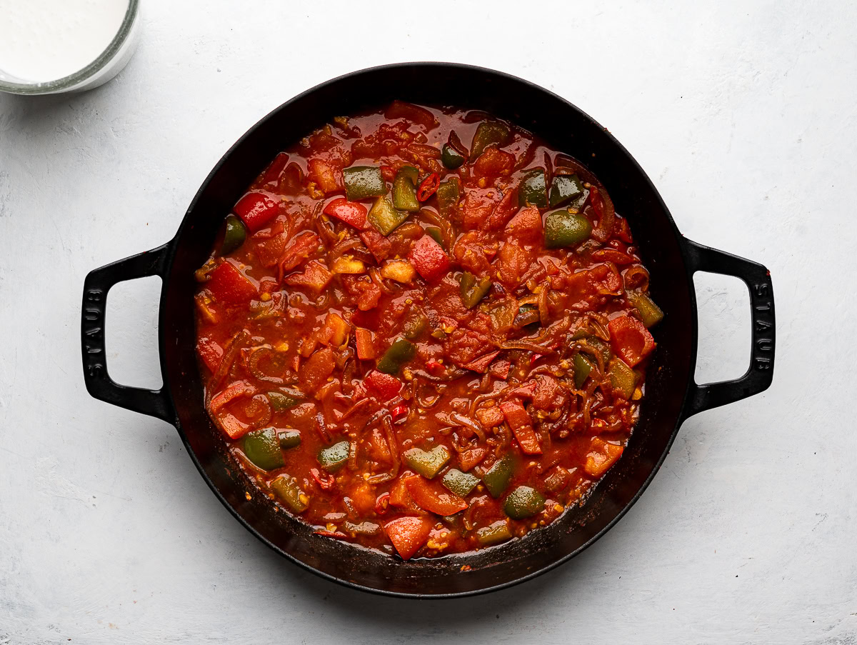 stewed tomatoes and vegetable mixture in skillet