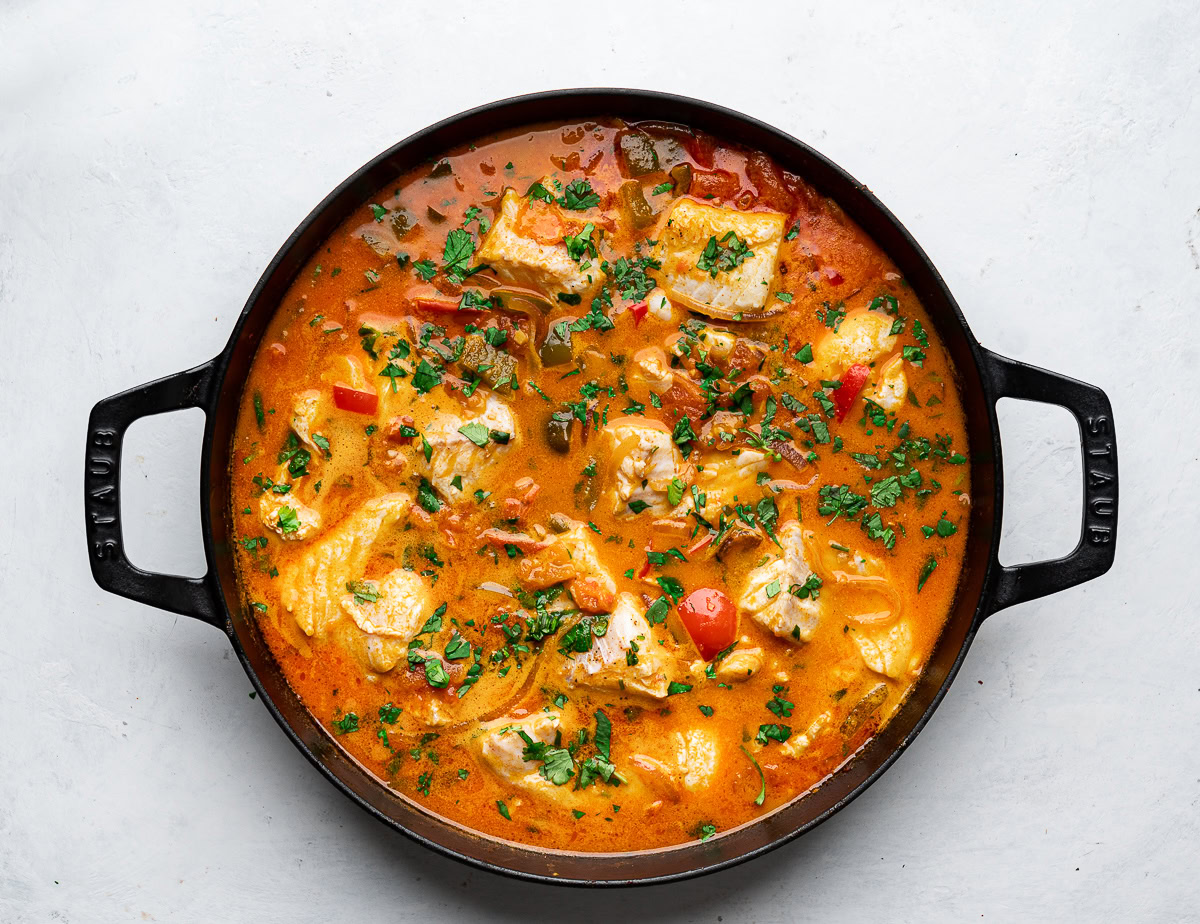 cooked stew in skillet with cilantro