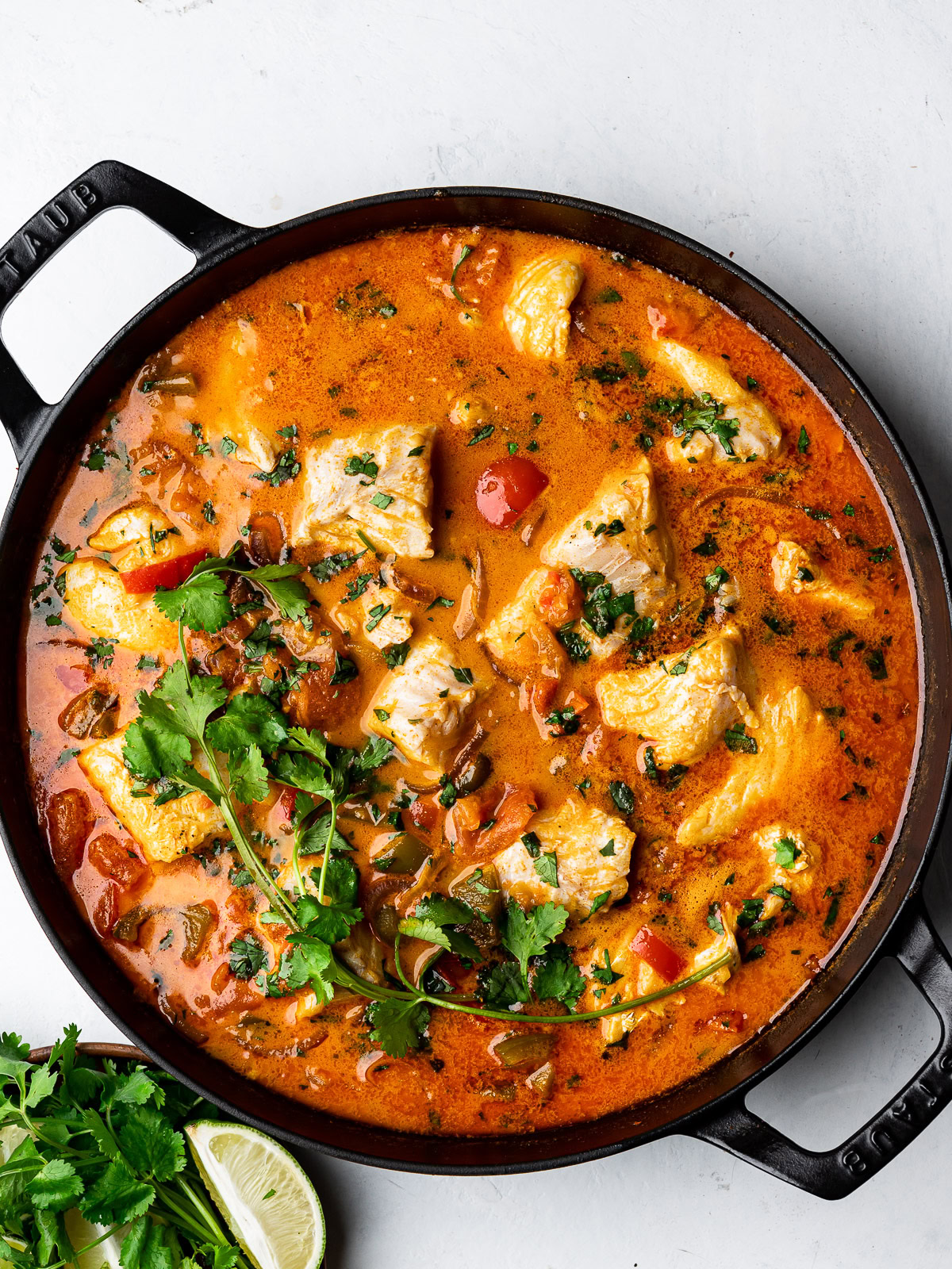 Cooked Brazilian Fish Stew (moqueca) in skillet 