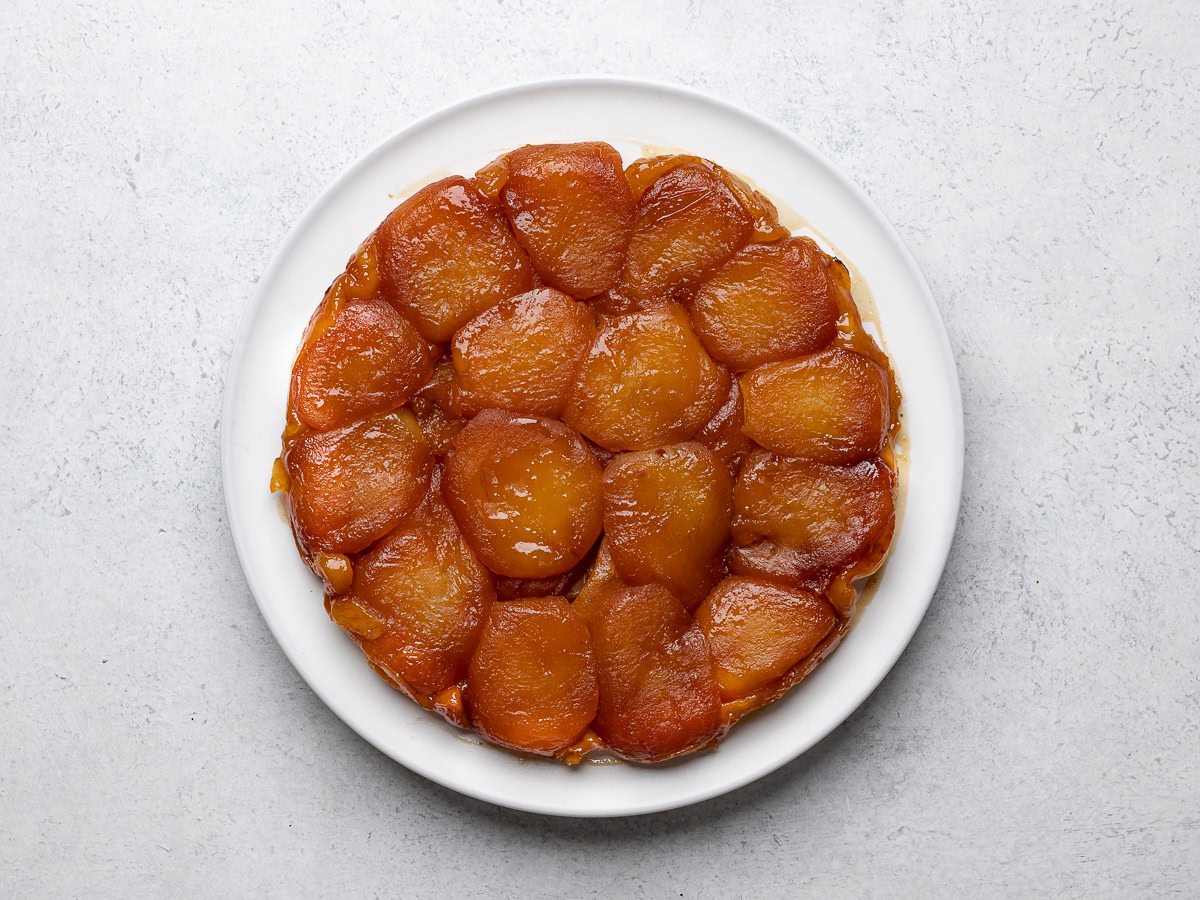 Apple tarte Tatin inverted on plate