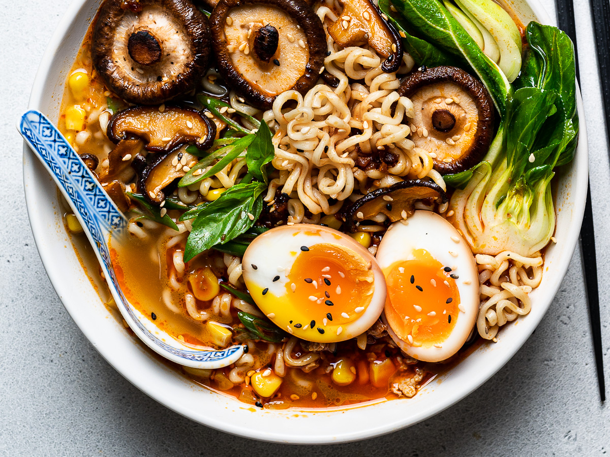 spicy miso ramen served in bowl with soy sauce eggs