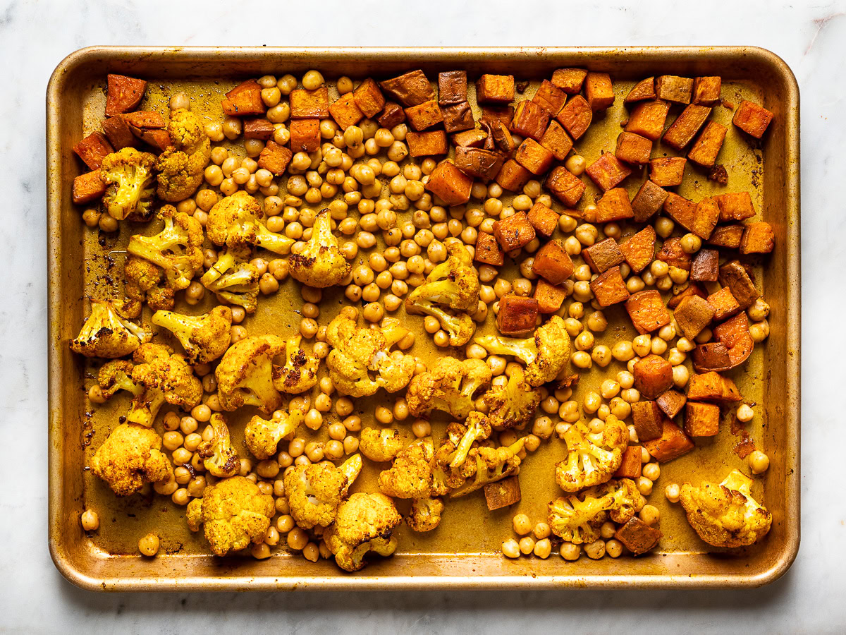 roasted cauliflower and sweet potatoes on sheet pan 