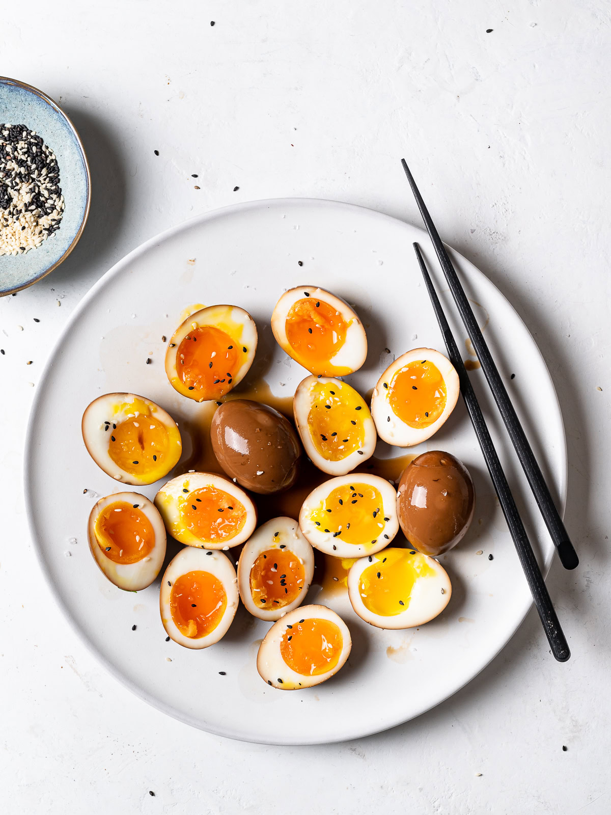 soy sauce eggs sliced in half on platter