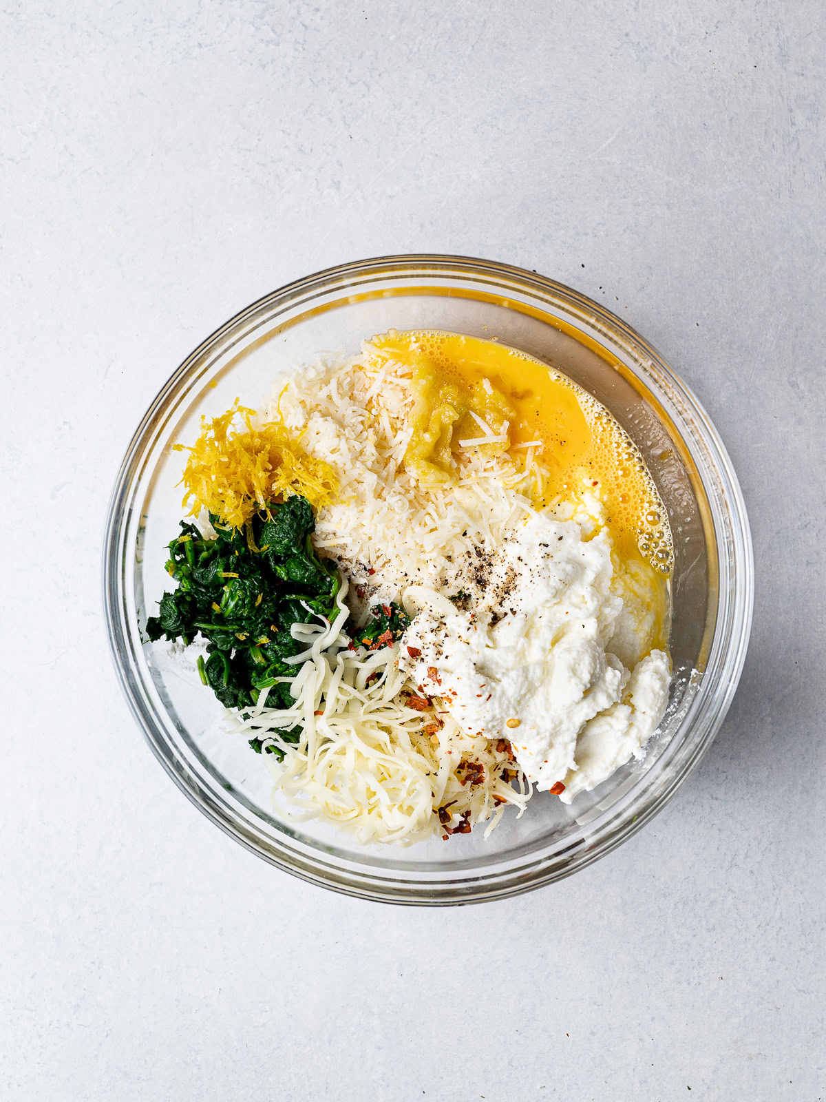 filling ingredients in bowl