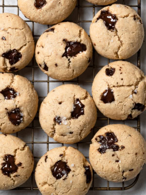 Vegan Tahini Chocolate Chip Cookies cooling on wire rack