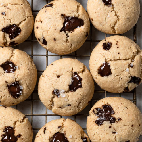 Vegan Tahini Chocolate Chip Cookies cooling on wire rack