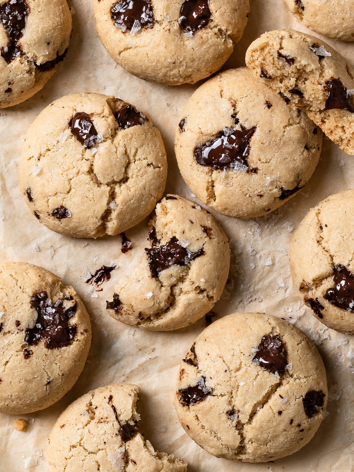 Vegan Tahini Chocolate Chip Cookies showing one bitten