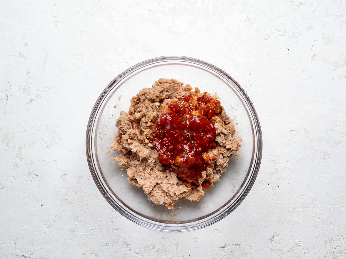 refried beans in bowls with salsa
