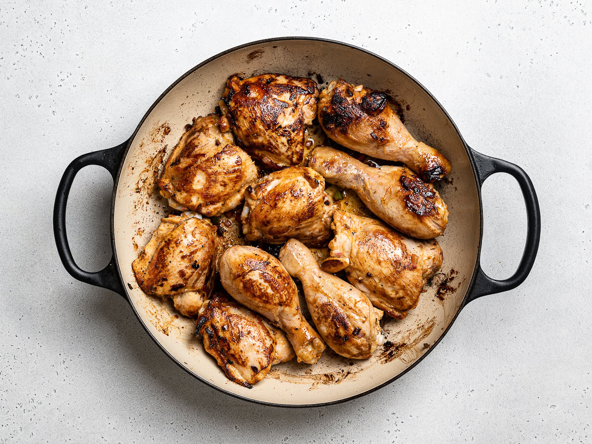 chicken pieces browned in skillet