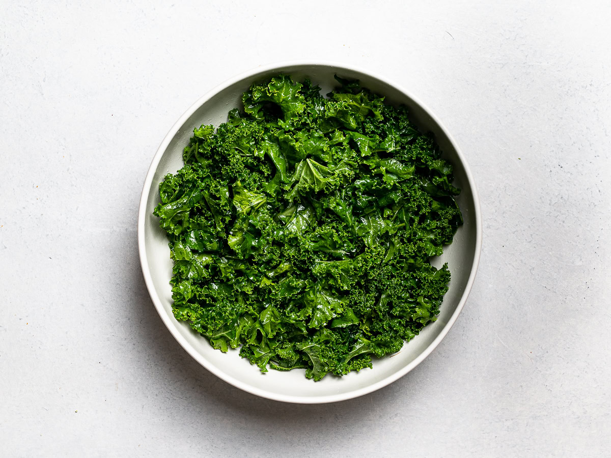 massaged kale leaves in a bowl