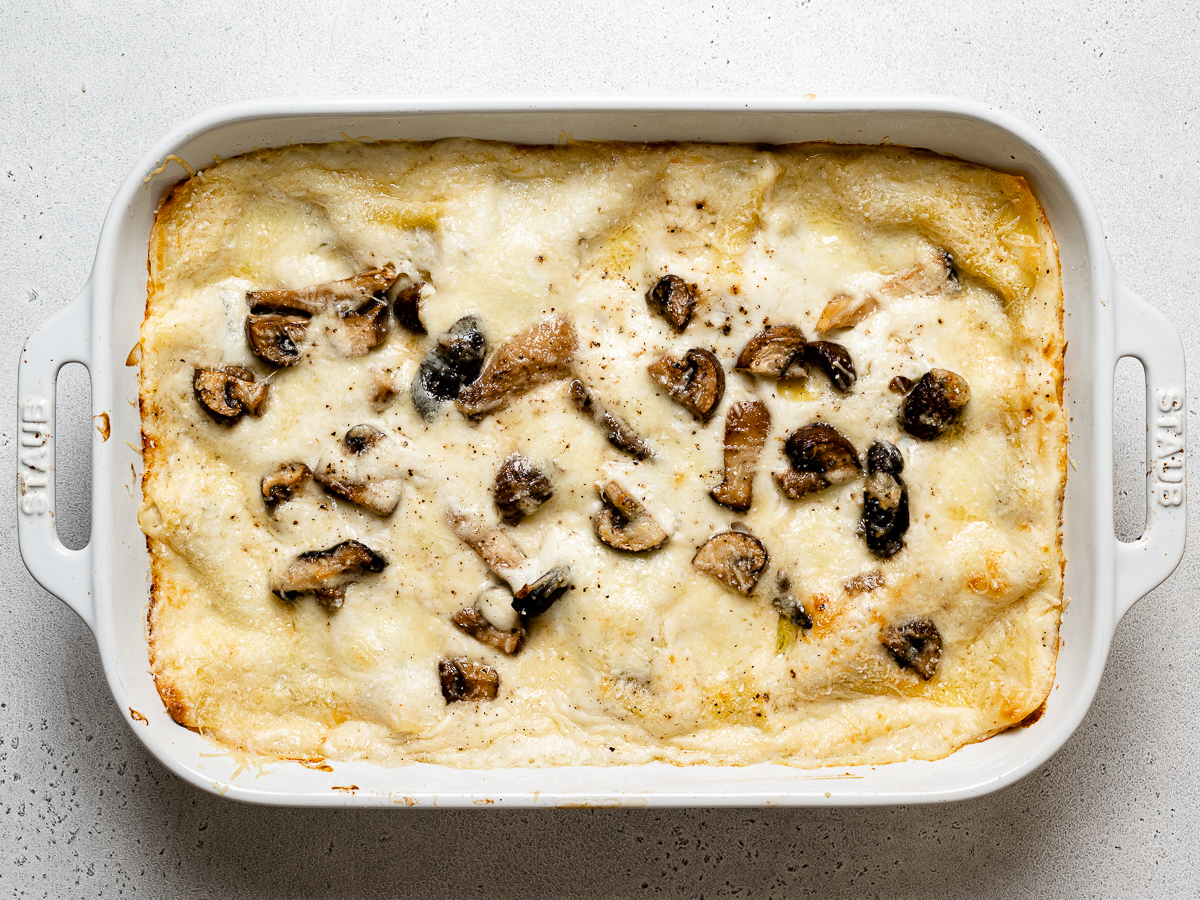 baked mushroom lasagna in baking dish