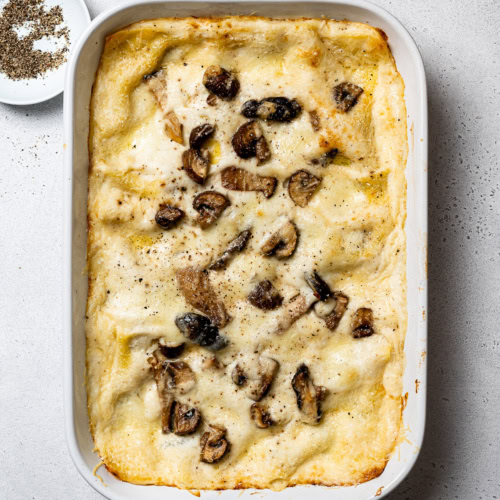 baked mushroom lasagna in baking dish