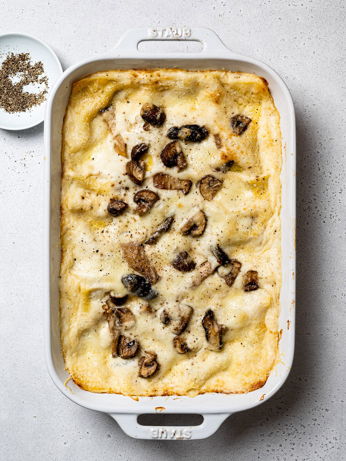 baked mushroom lasagna in baking dish