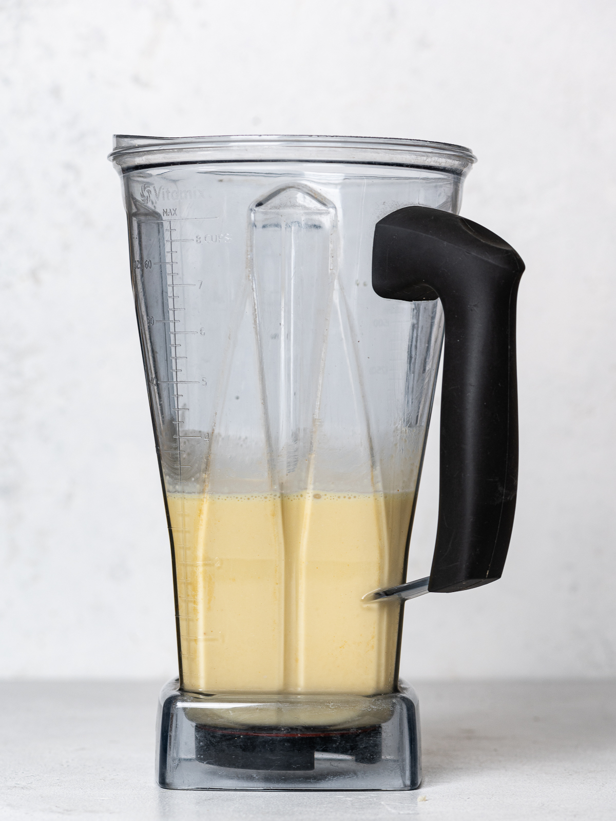 side view of blender containing blended egg mixture