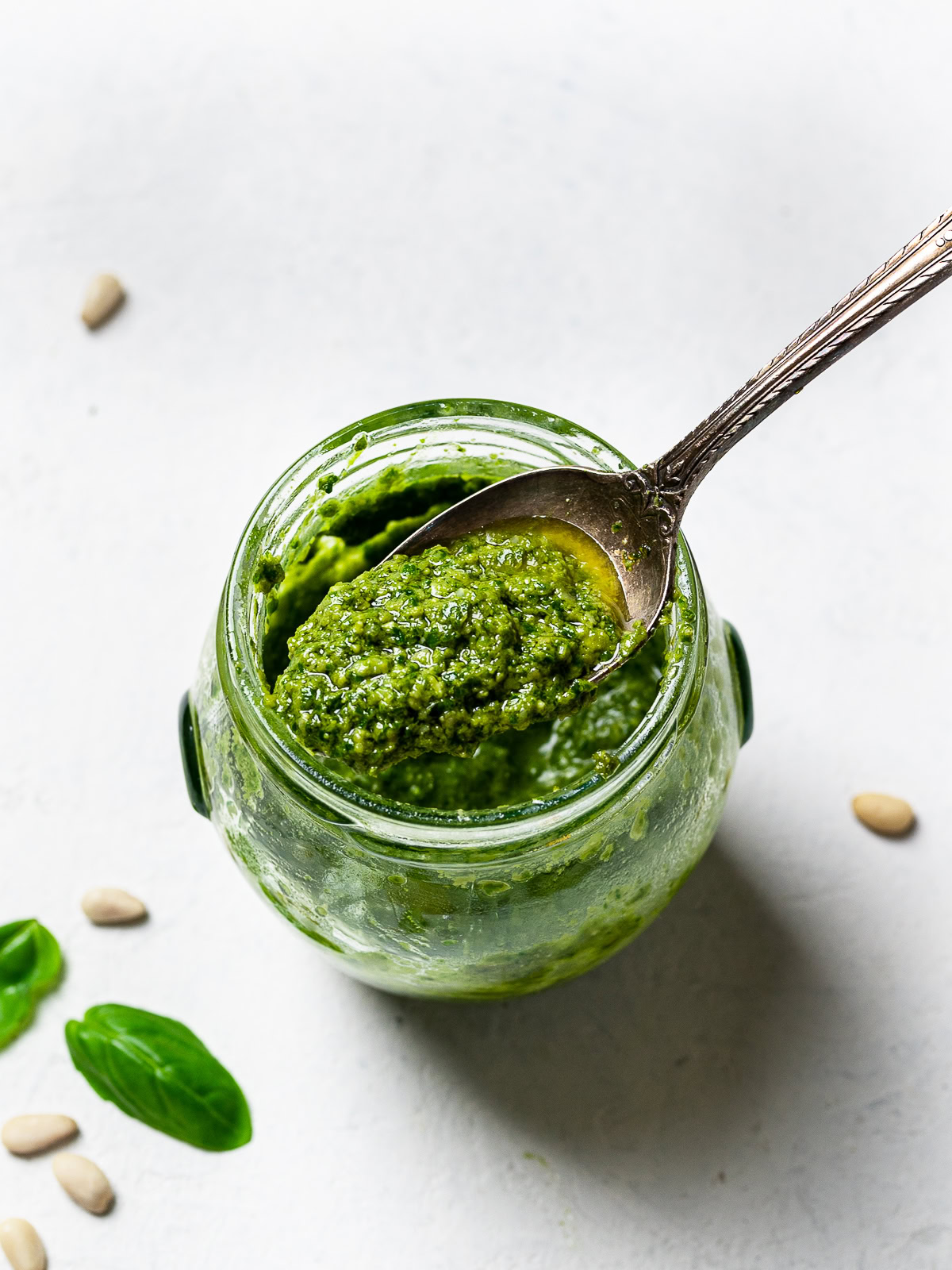 pesto in jar with spoon 