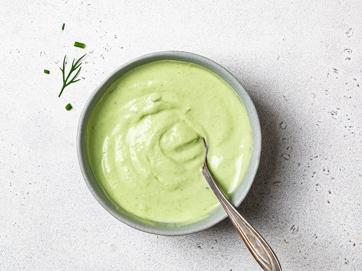 herby yogurt sauce in bowl used for dipping 