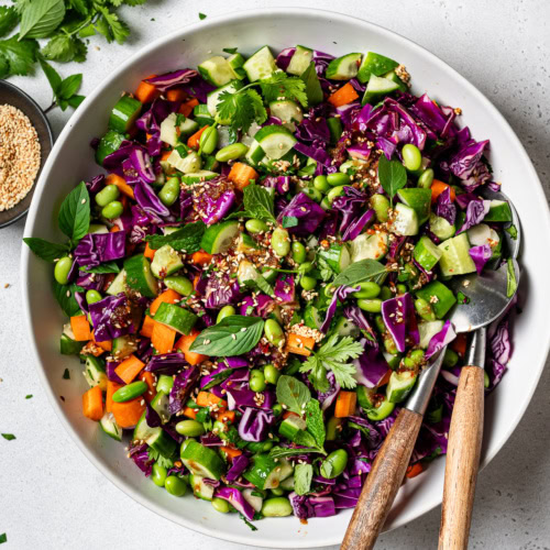 Thai chopped salad with sesame-ginger dressing served in salad bowl