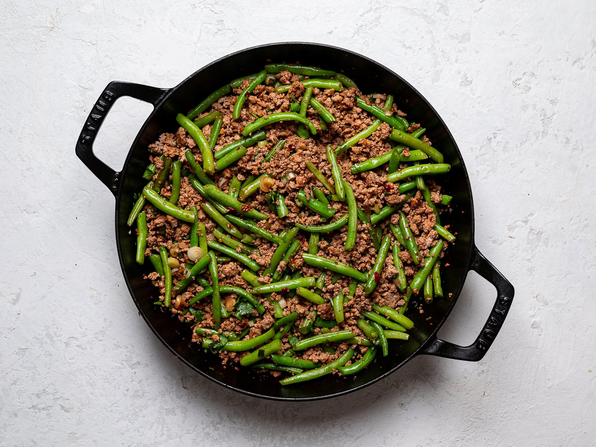 ground turkey and green bean mixture mixed in  skillet