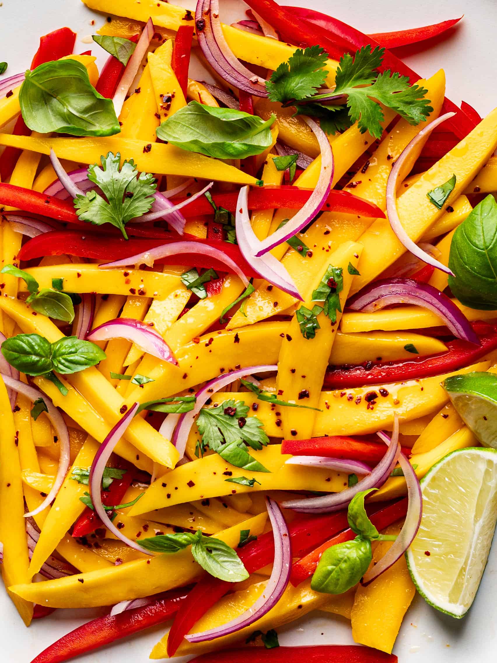 close up of dressed mango salad 