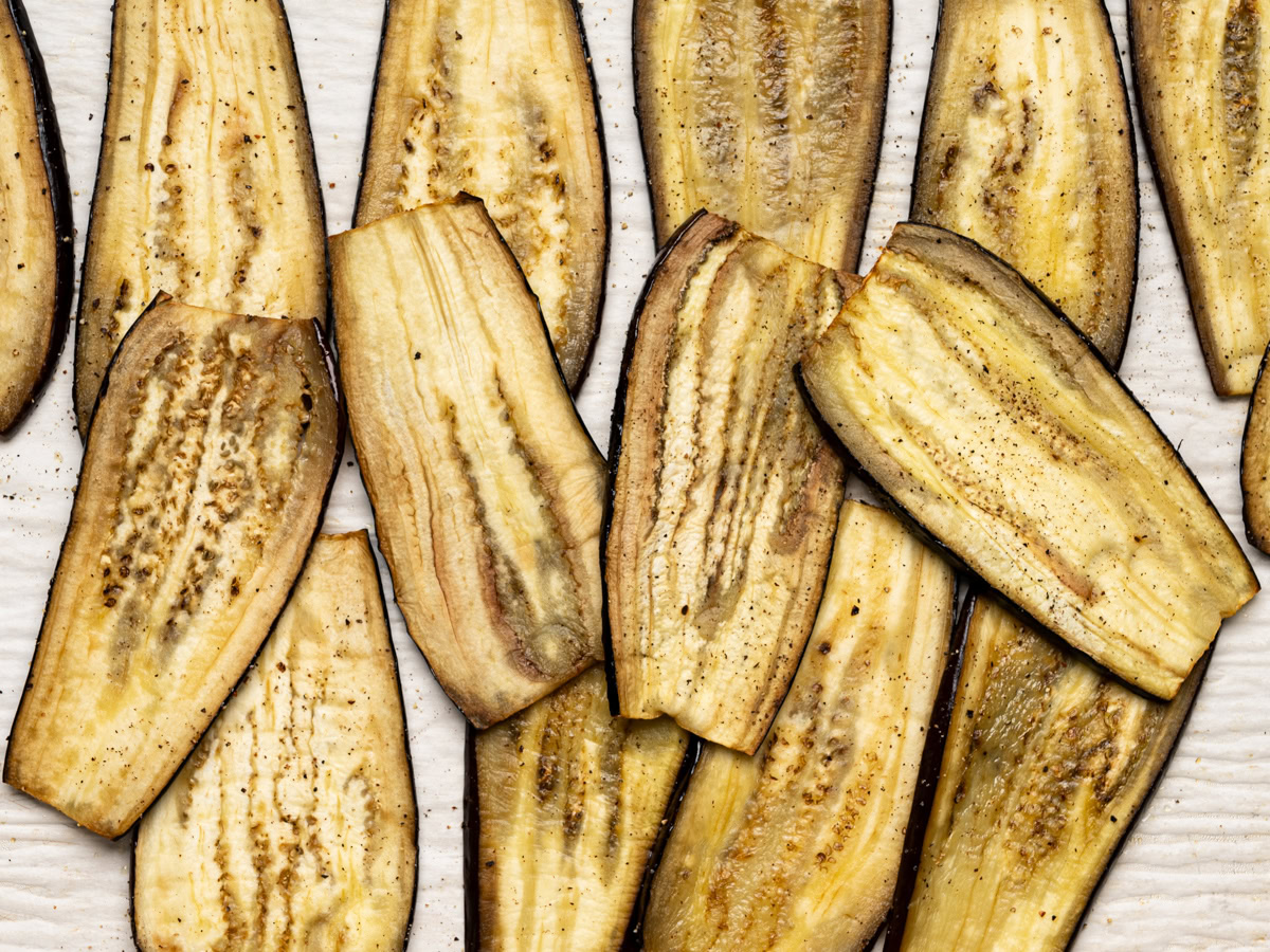 baked eggplant slices on sheet pan 